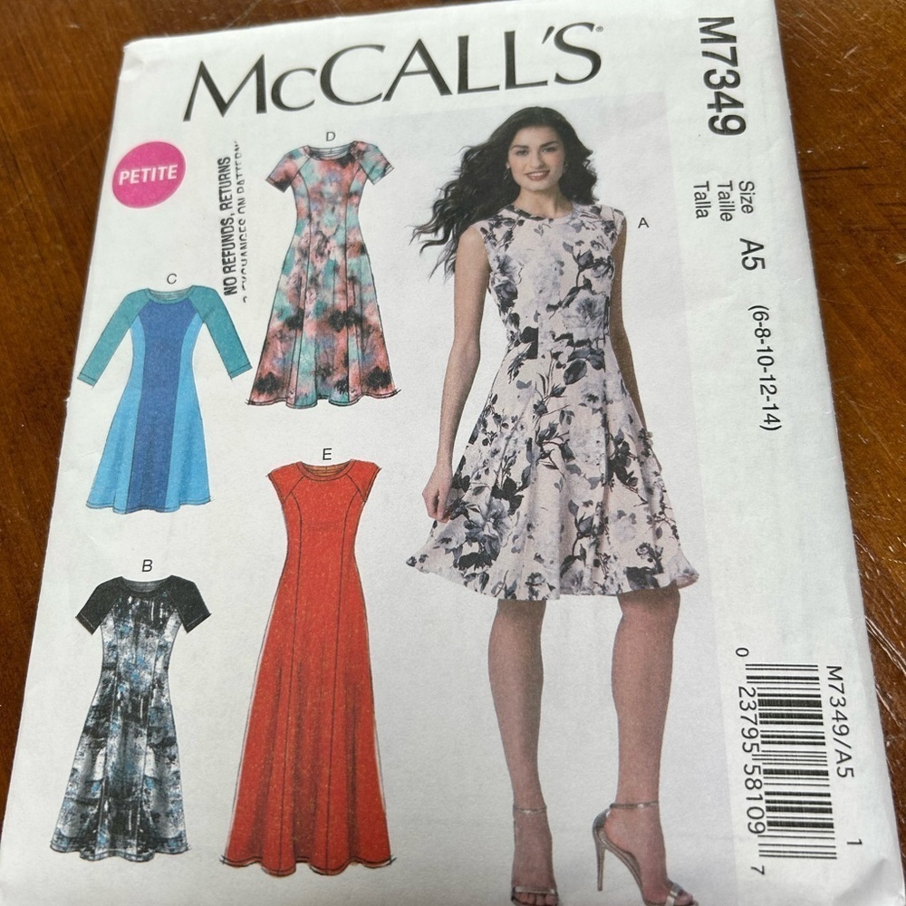 McCalls M7349- raglan sleeve flare dresses- 6 to 14 uncut